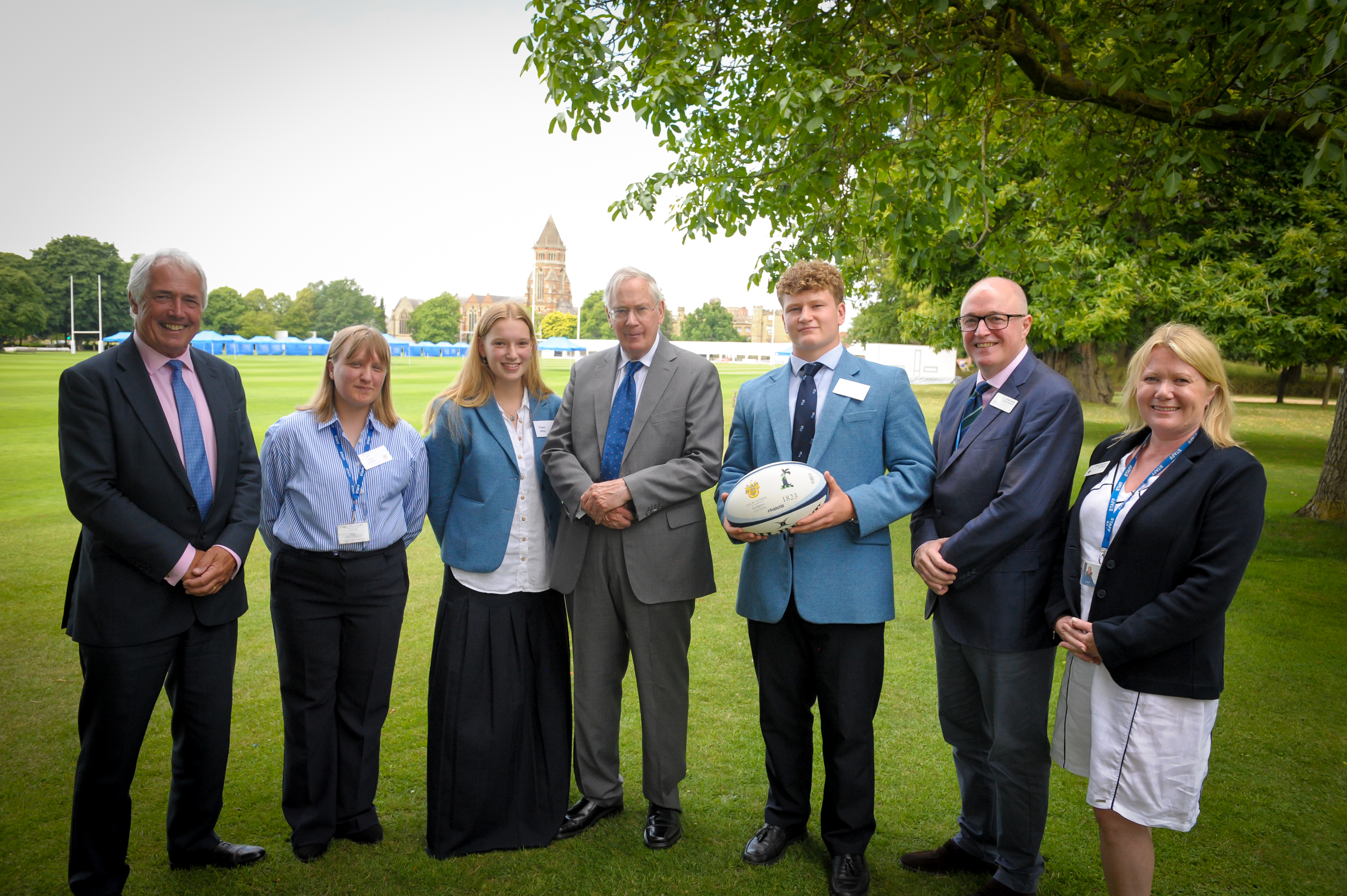 Lord Lieutenant Tim Cox (left) with HRH The Duke of Gloucester (centre) and staff and students at Rugby School.