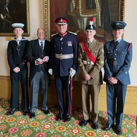 Lord Lieutenant Tim Cox (centre) with Martin Dymock (second from left) and the Lord Lieutenant’s cadets.