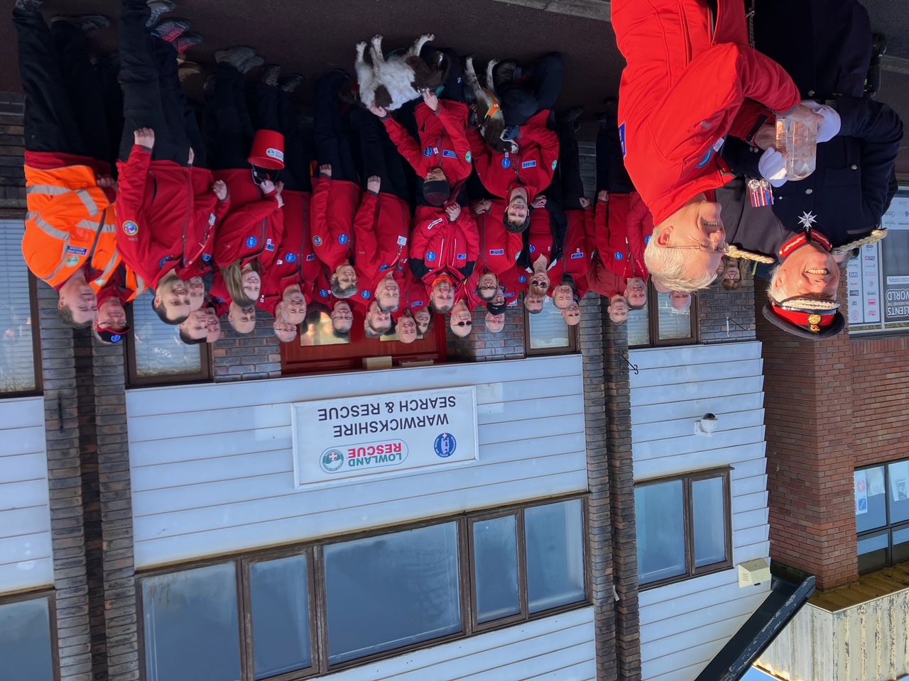 The Warwickshire Search and Rescue team being presented with their KAVS by Lord Lieutenant Tim Cox.