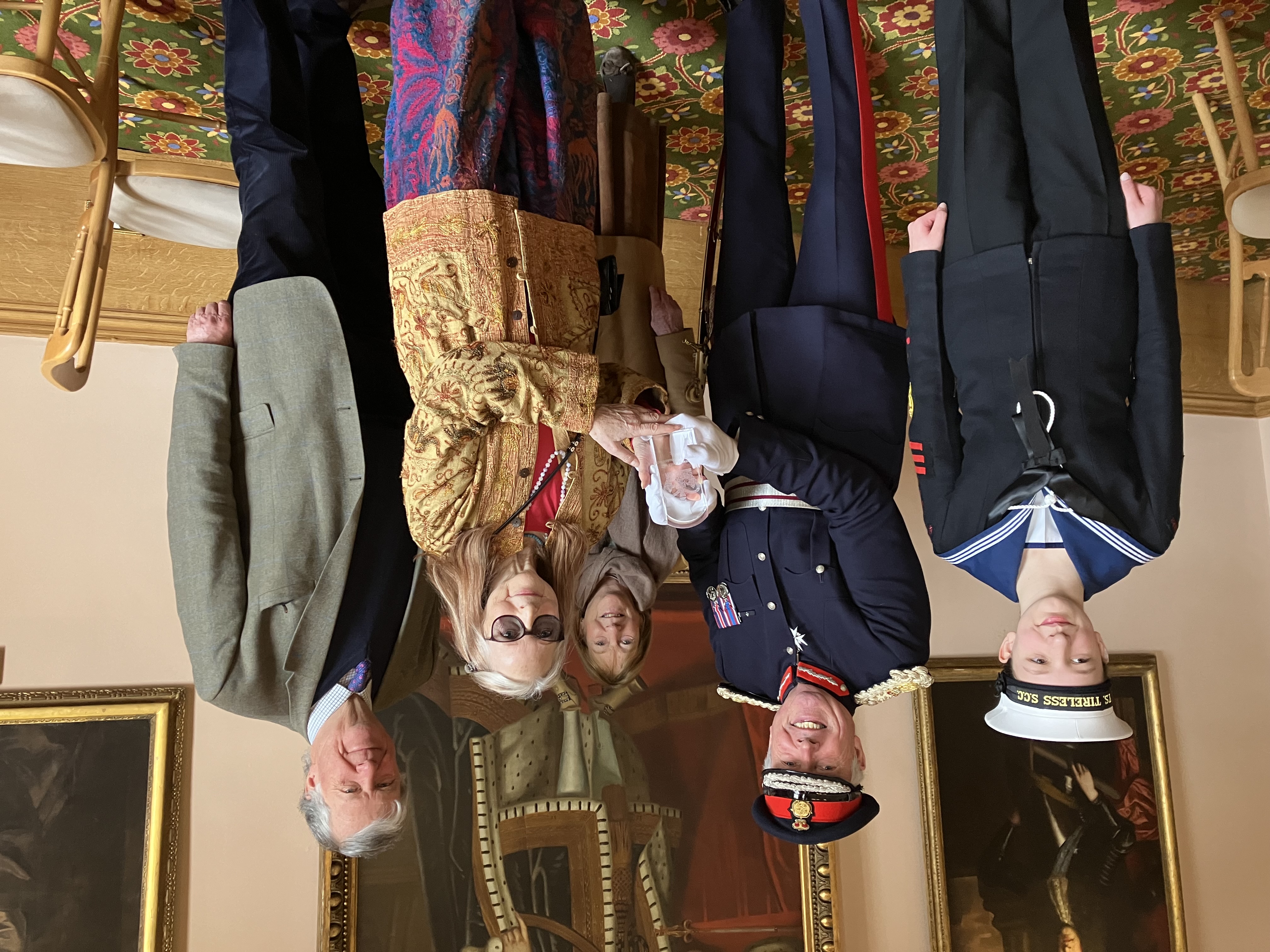 Julie de Bastion (second from right) being presented with Own Books’ KAVS by Lord Lieutenant Tim Cox.