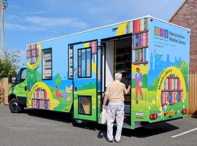 Warwickshire Mobile Library Van parked in a car park