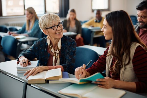 Two women in a classroom