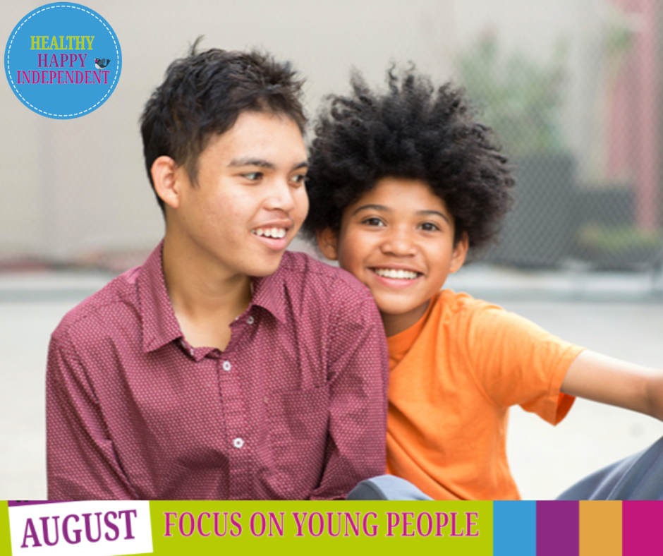 Two young carers laughing together