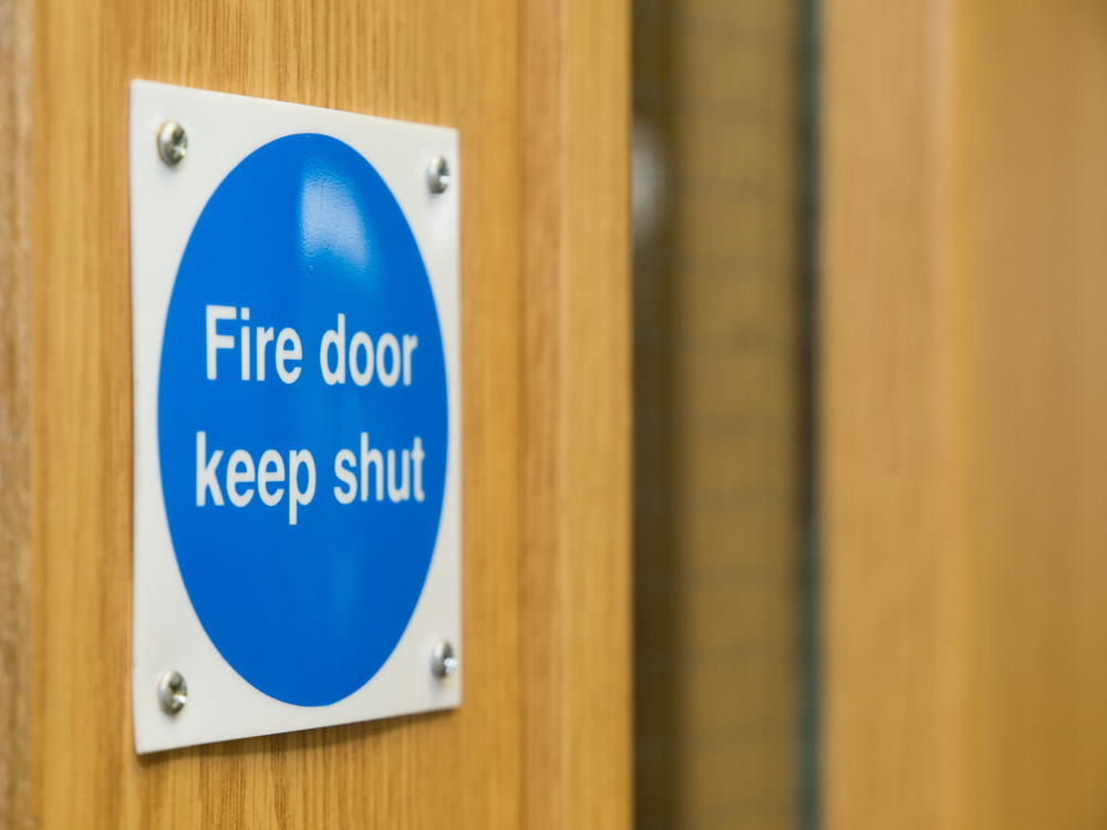 Photo of 'Fire door keep shut' sign on fire door