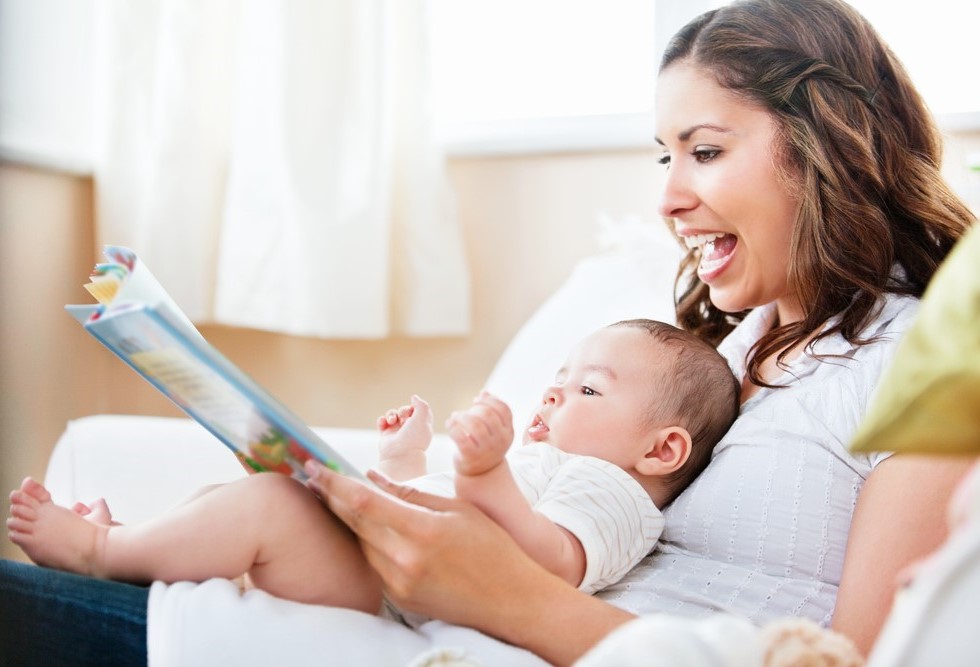 Parent reading to a baby