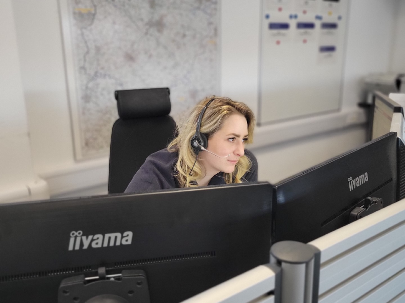 Angharad - fire control officer sat at desk